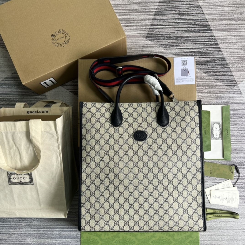 G*u*i shopping bags
